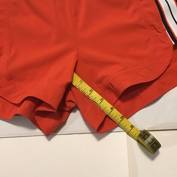 Athleta Ascender Athletic Shorts Orange - Picture 4 of 9